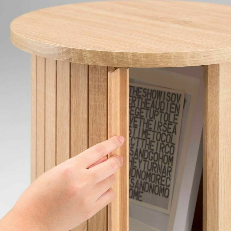 [じゃばら扉がおしゃれ。]円にそって開く扉の動きがユニークです。 ※画像はCMO-3035JNA