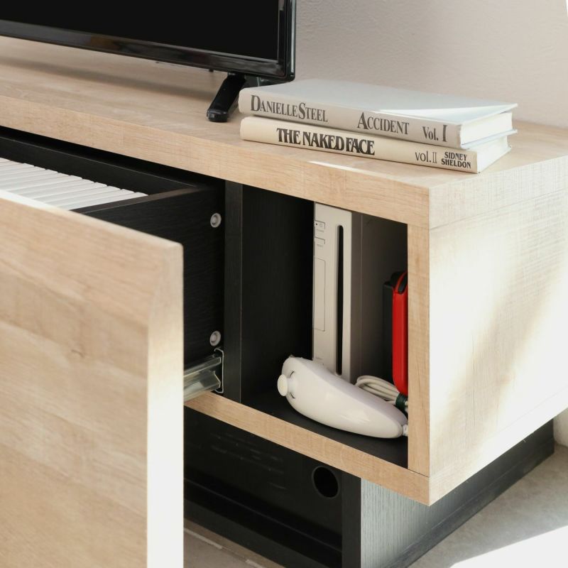 [縦型ゲーム機の収納]引き出しの左右２ヵ所に、Wifiルーターや、Switch・Wiiなどの縦置きのゲーム機が入るスペースがあります。