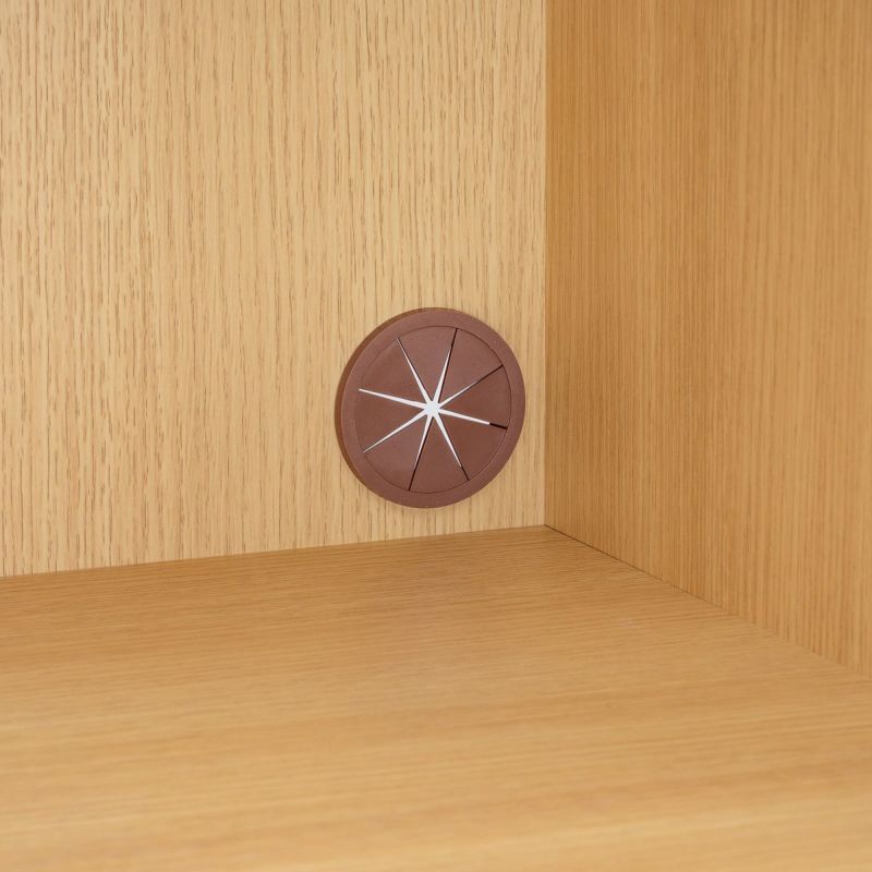 [電源コードを通せる配線用ゴムコーダー]レンジ置き場の背面には配線用ゴムコーダーが付いているので、家電の電源コードを通すことができます。