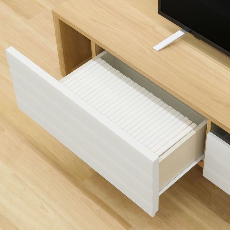 [引き出し収納]DVDやリビング小物の収納に使える引き出し収納。DVDはタイトル面を上にして左右それぞれに約29枚、計約58枚収納できます。