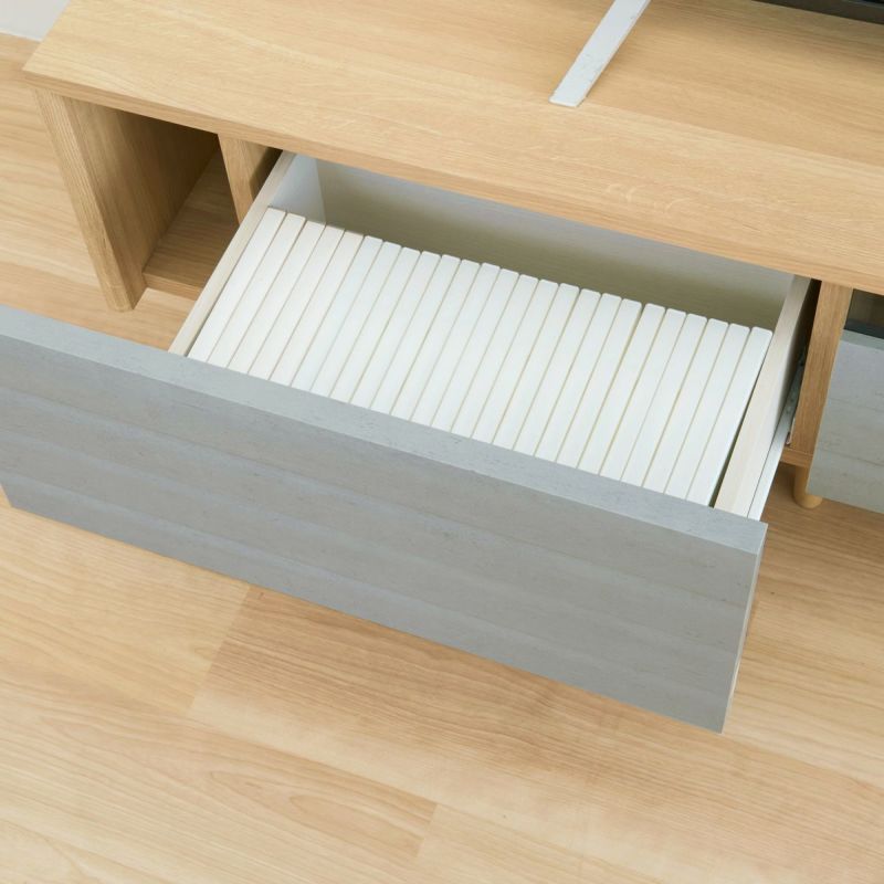 [引き出し収納]DVDやリビング小物の収納に使える引き出し収納。DVDはタイトル面を上にして左右それぞれに約29枚、計約58枚収納できます。